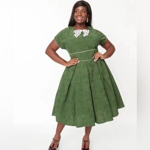 Unique Vintage Green Fit-and-Flare Midi Dress with Polka Dot Bow